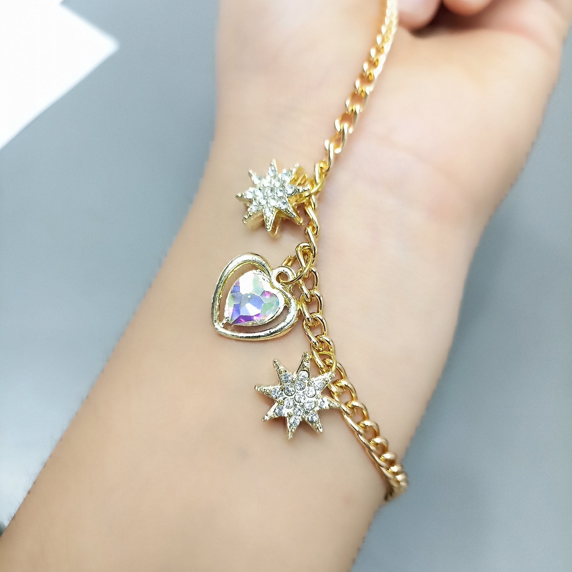 Gold bracelet with Sparkling Heart & Star Pendants
