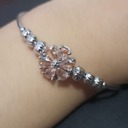 Silver-Toned Adjustable Bangle with Gemstone Flower